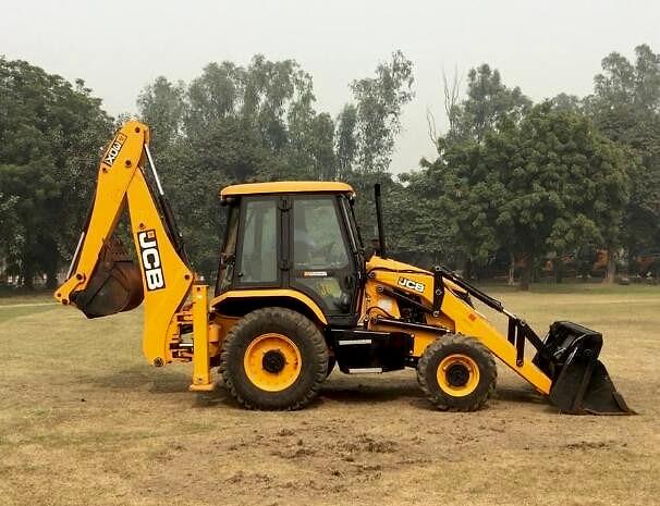 JCB 3DX backhoe loader on open ground